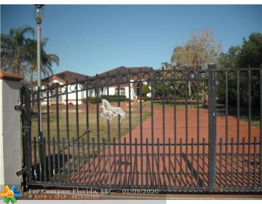 5410 Melaleuca Road Southwest Ranches, FL 33330 - Photo 1 of 25 Exterior Front