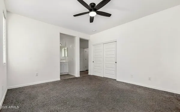 a kitchen with stainless steel appliances granite countertop a sink and a counter space