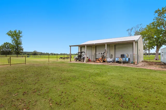 a view of a lake with a big yard