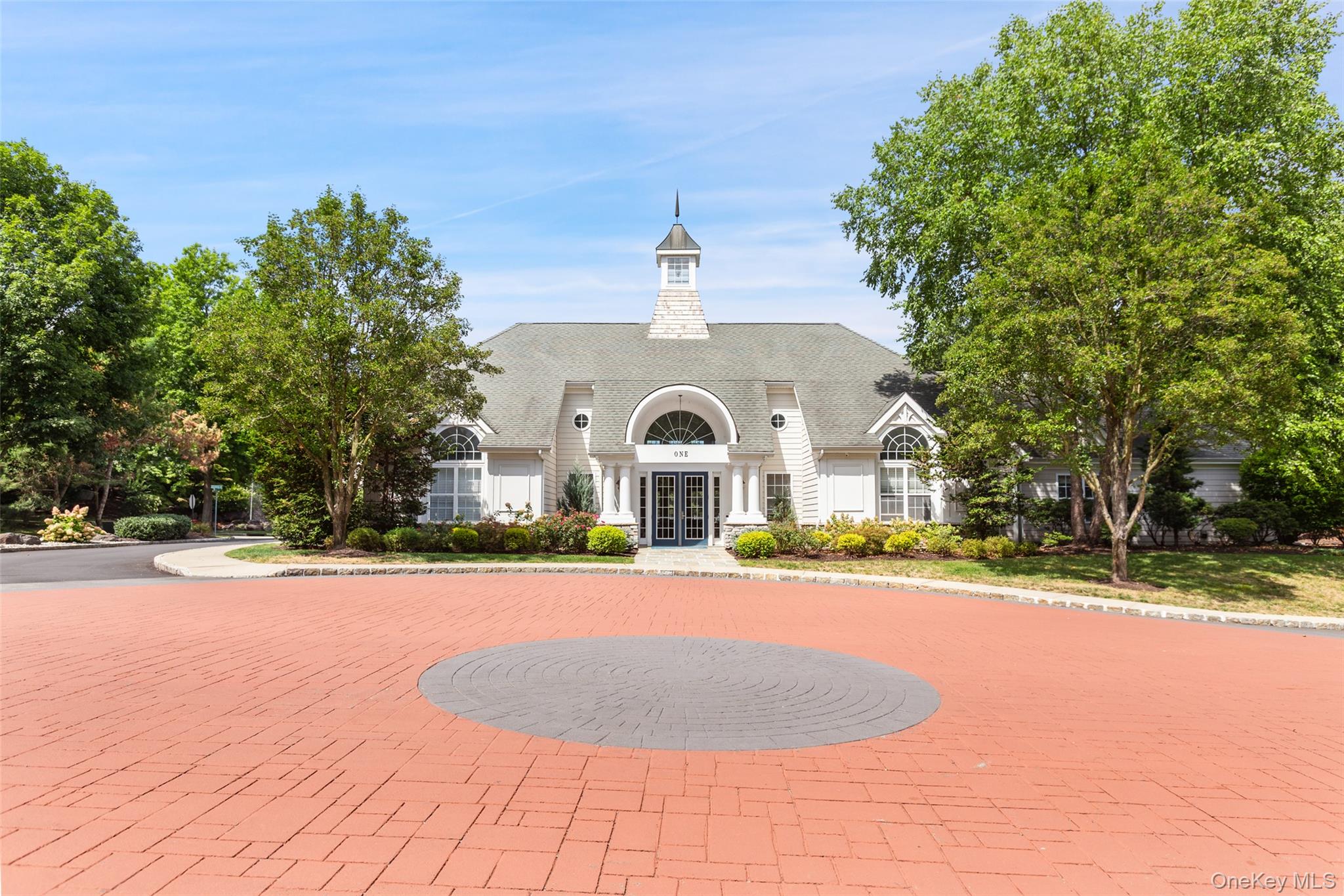 223 Viewpoint Terrace Peekskill, NY 10566 - Photo 24 of 30 View of building exterior featuring curved driveway