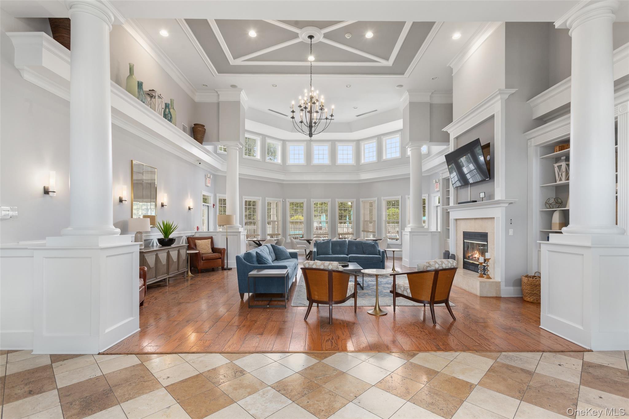 223 Viewpoint Terrace Peekskill, NY 10566 - Photo 27 of 30 Common area featuring a towering ceiling, crown molding, and recessed lighting