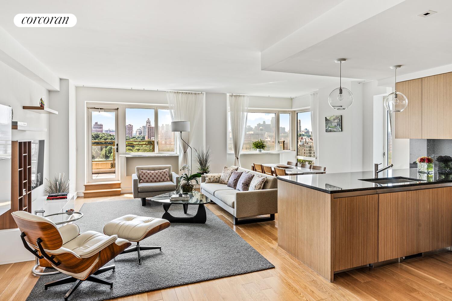 1280 5th Avenue, Unit 11A Manhattan, NY 10029 - Photo 1 of 22 a living room with furniture and a large window