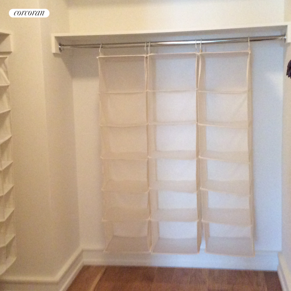 1280 5th Avenue, Unit 11A Manhattan, NY 10029 - Photo 14 of 22 a view of an empty walk in closet