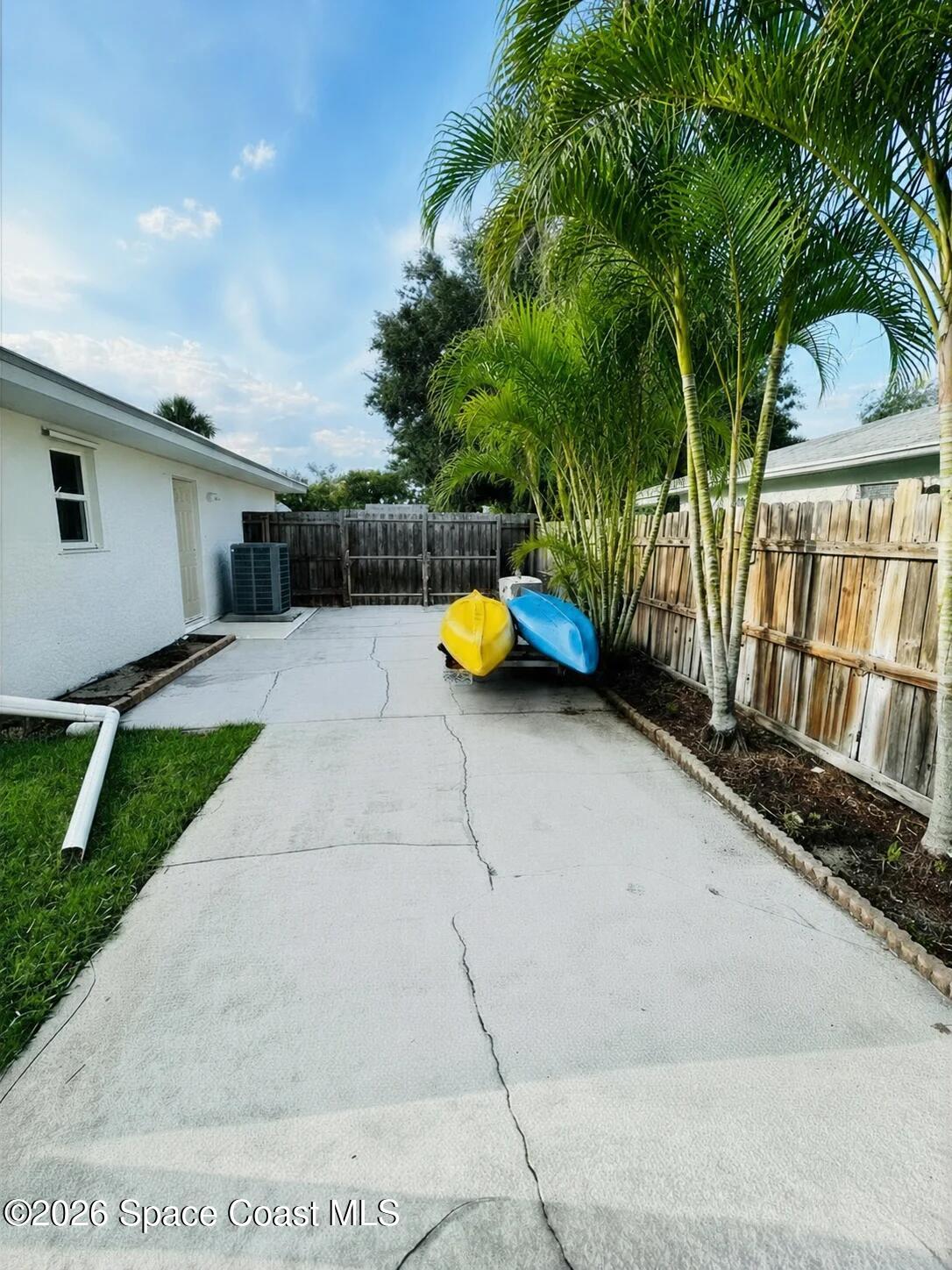 429 Rio Lane Indialantic, FL 32903 - Photo 37 of 48 SIDE DRIVEFENCED B