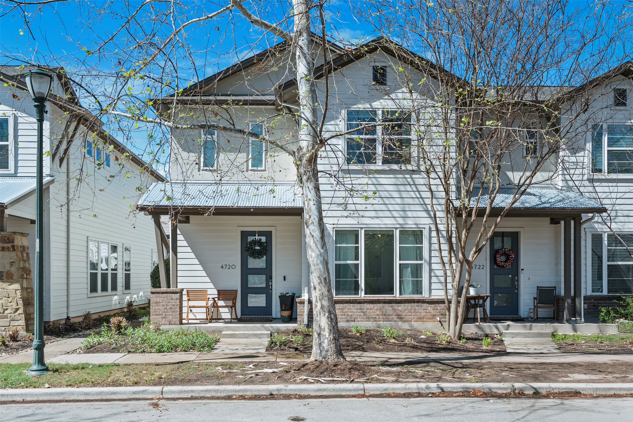 4720 Page Street Austin, TX 78723 - Photo 1 of 1 a view of a brick house with large windows
