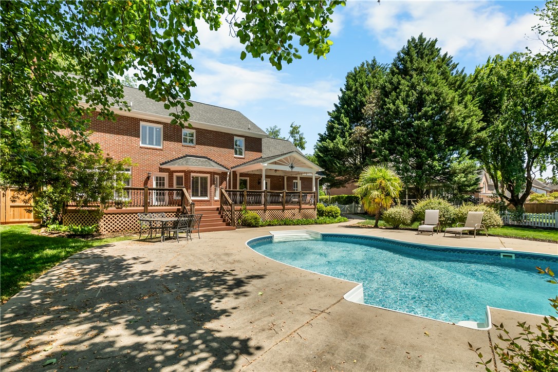 312 English Oak Road Simpsonville, SC 29681 - Photo 43 of 48 This spacious brick home features an inviting backyard oasis with a refreshing in-ground pool.