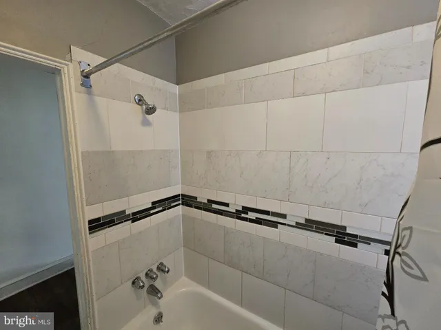 a close view of a bathtub in bathroom