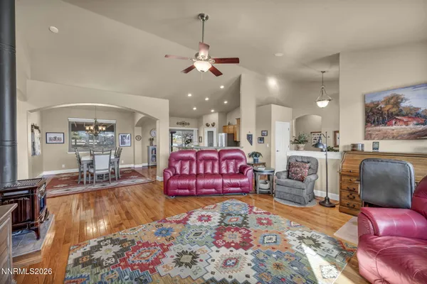 a large kitchen with kitchen island granite countertop a large counter top stainless steel appliances and cabinets