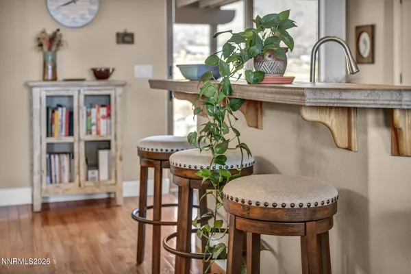 a open kitchen with sink cabinets and wooden floor