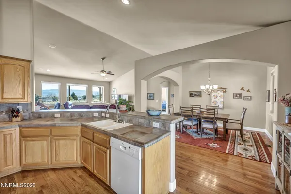 a kitchen with a stove and cabinets