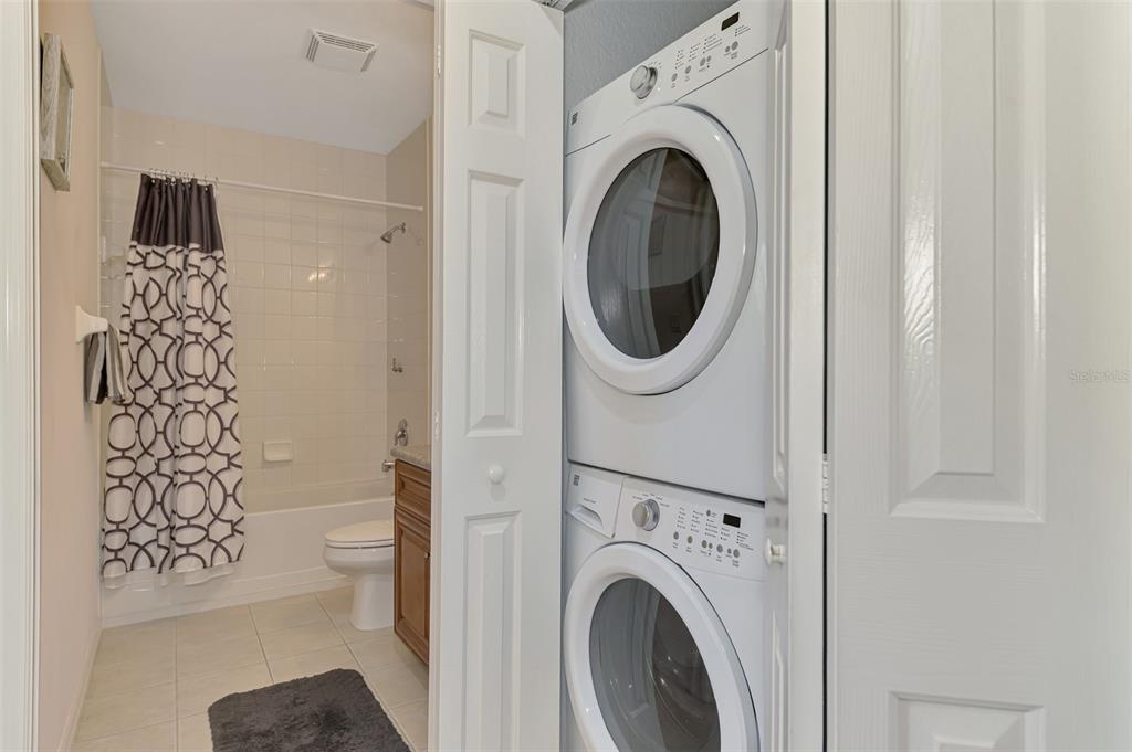 8409 Placida Road, Unit 206 Placida, FL 33946 - Photo 35 of 67 a view of a hallway with washer and dryer