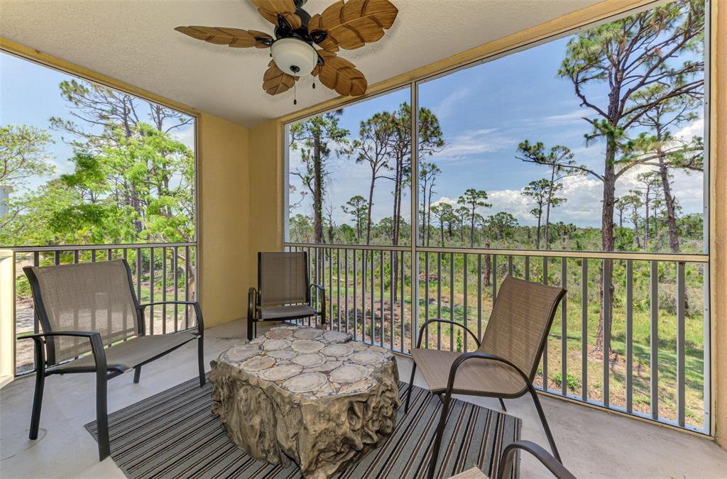 8409 Placida Road, Unit 206 Placida, FL 33946 - Photo 36 of 67 a view of a balcony with furniture