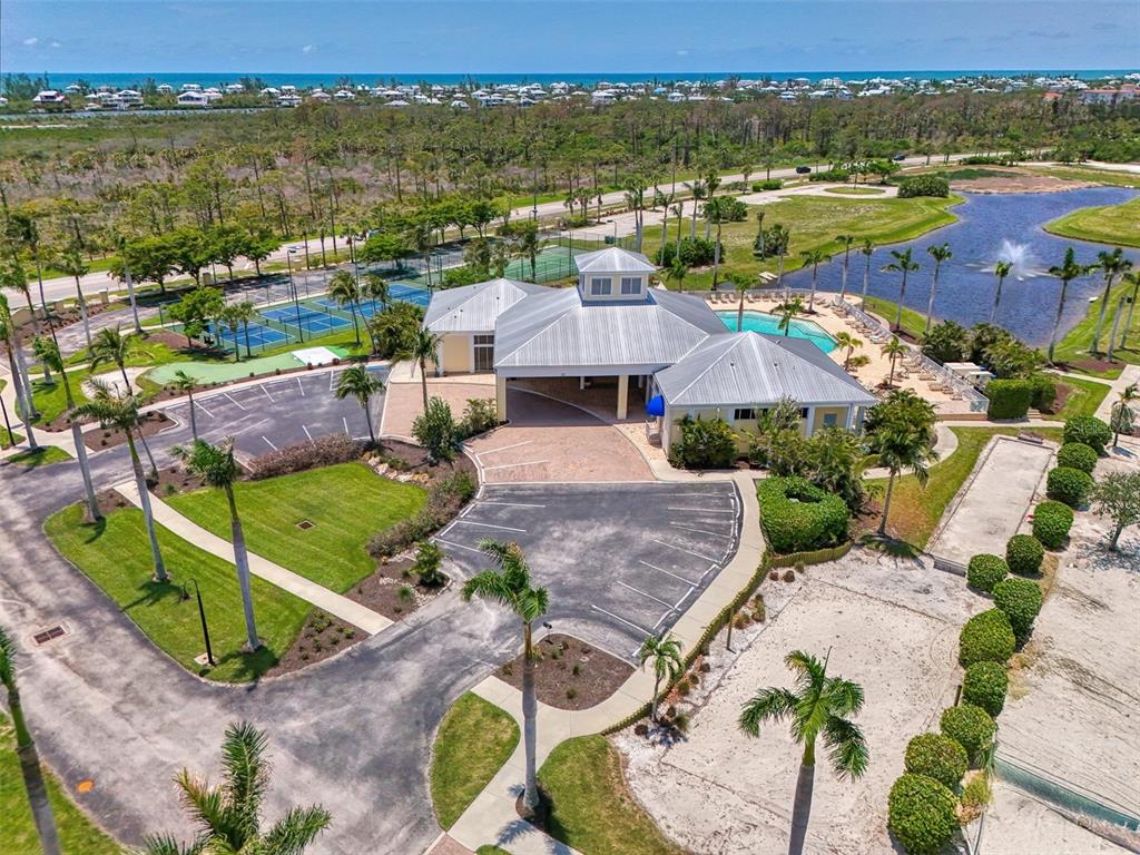 8409 Placida Road, Unit 206 Placida, FL 33946 - Photo 44 of 67 an aerial view of residential houses with outdoor space and ocean view