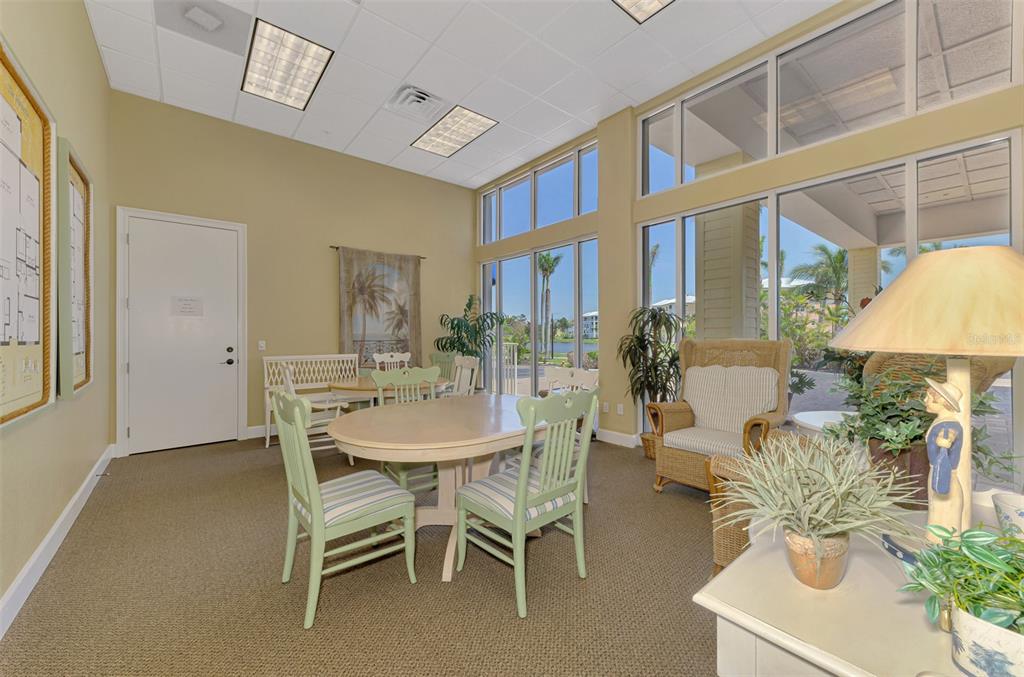 8409 Placida Road, Unit 206 Placida, FL 33946 - Photo 58 of 67 a dining room with furniture and a chandelier