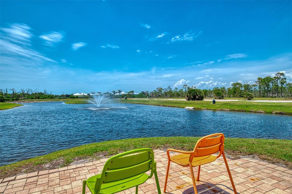 8409 Placida Road, Unit 206 Placida, FL 33946 - Photo 65 of 67 a view of a lake with a big yard