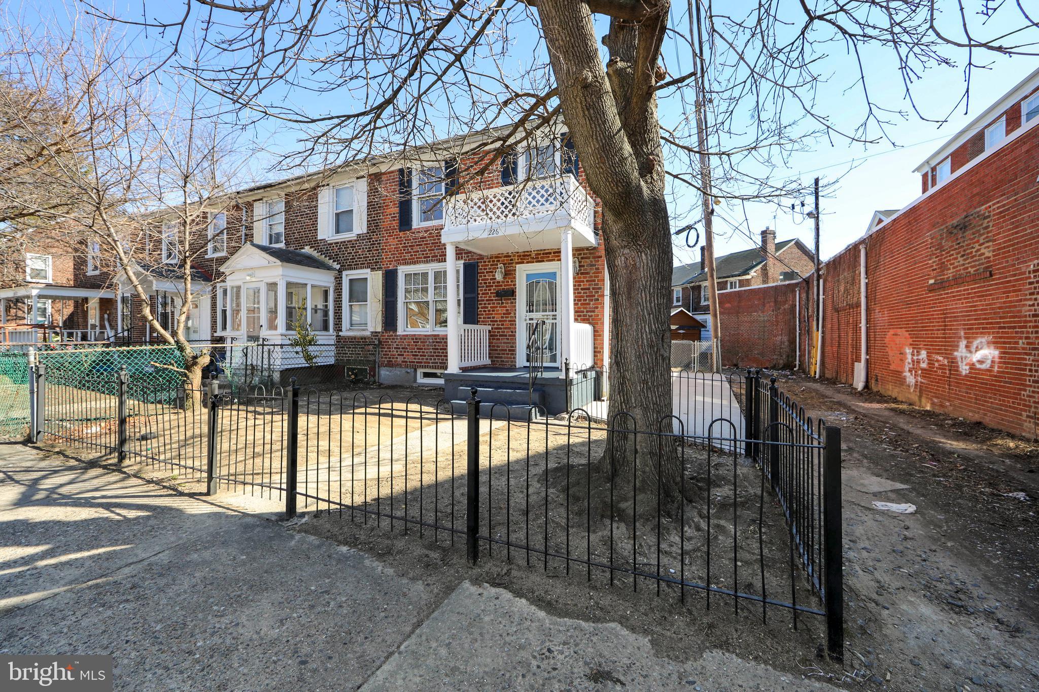 1226 America Road Camden, NJ 08104 - Photo 3 of 30 a front view of a house with a yard