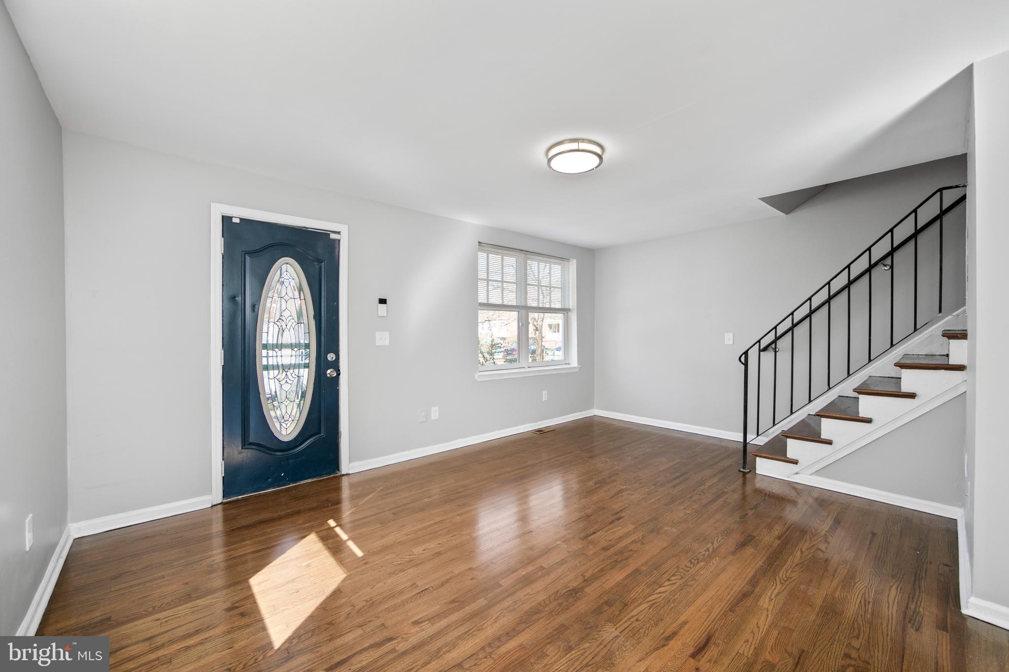 1226 America Road Camden, NJ 08104 - Photo 5 of 30 a view of an entryway with wooden floor