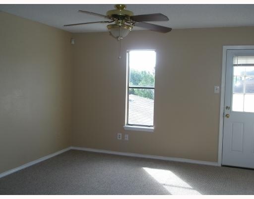 6802 Fawn Ridge Drive Corpus Christi, TX 78413 - Photo 4 of 4 an empty room with a window