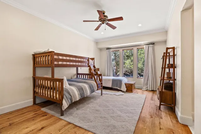 a view of a patio with table and chairs and potted plants