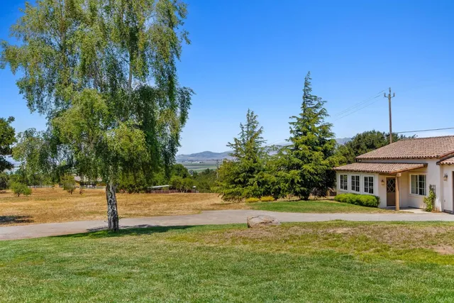 a view of a city with mountains in the back