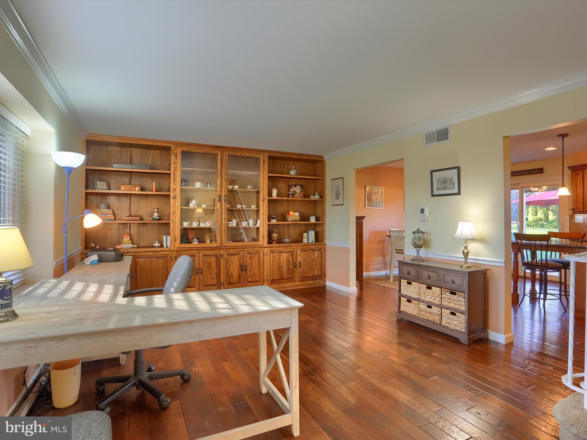 5256 Strathmore Drive Mechanicsburg, PA 17050 - Photo 11 of 47 a living room with furniture and wooden floor