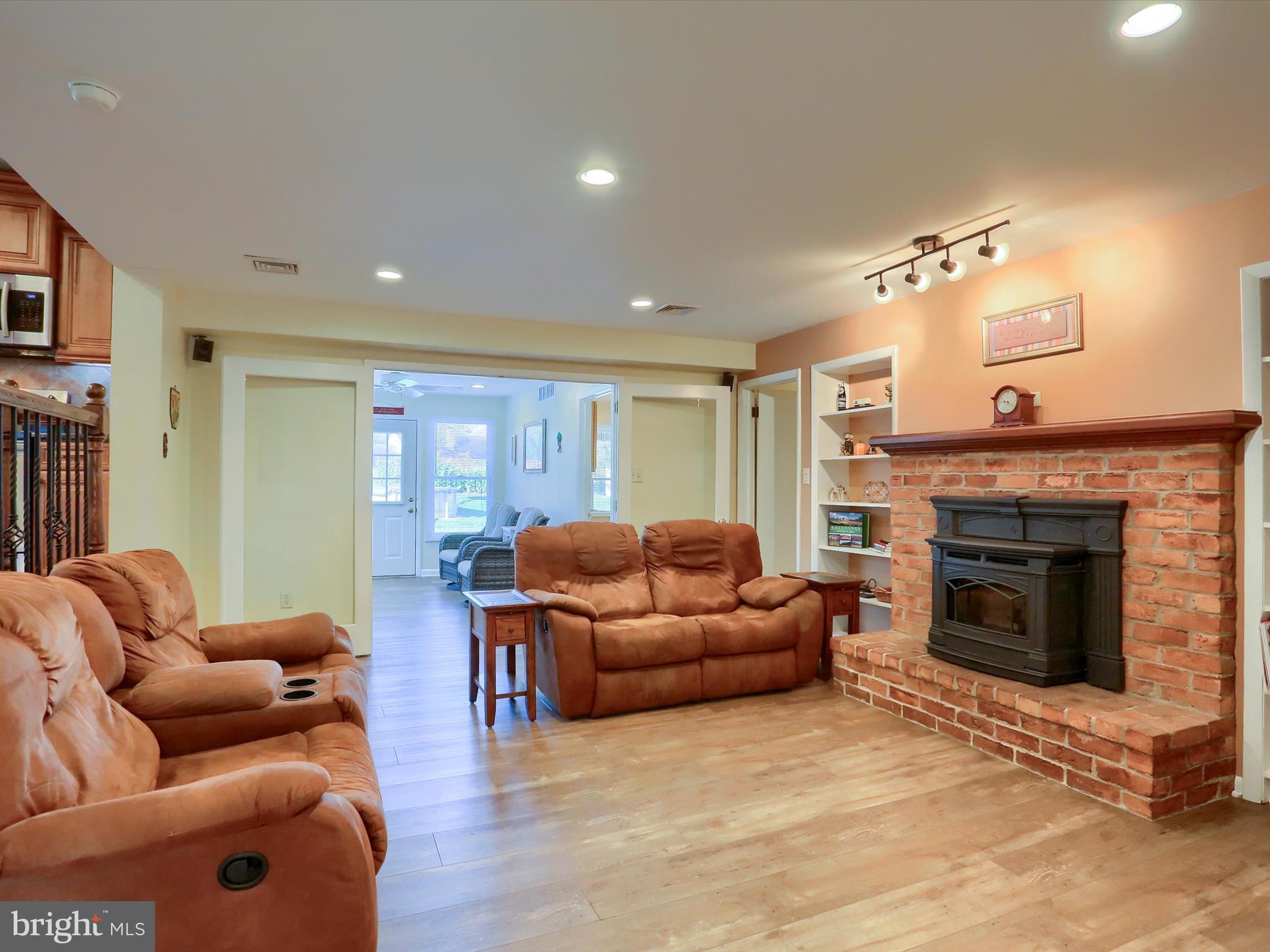 5256 Strathmore Drive Mechanicsburg, PA 17050 - Photo 14 of 47 a living room with furniture and a fireplace