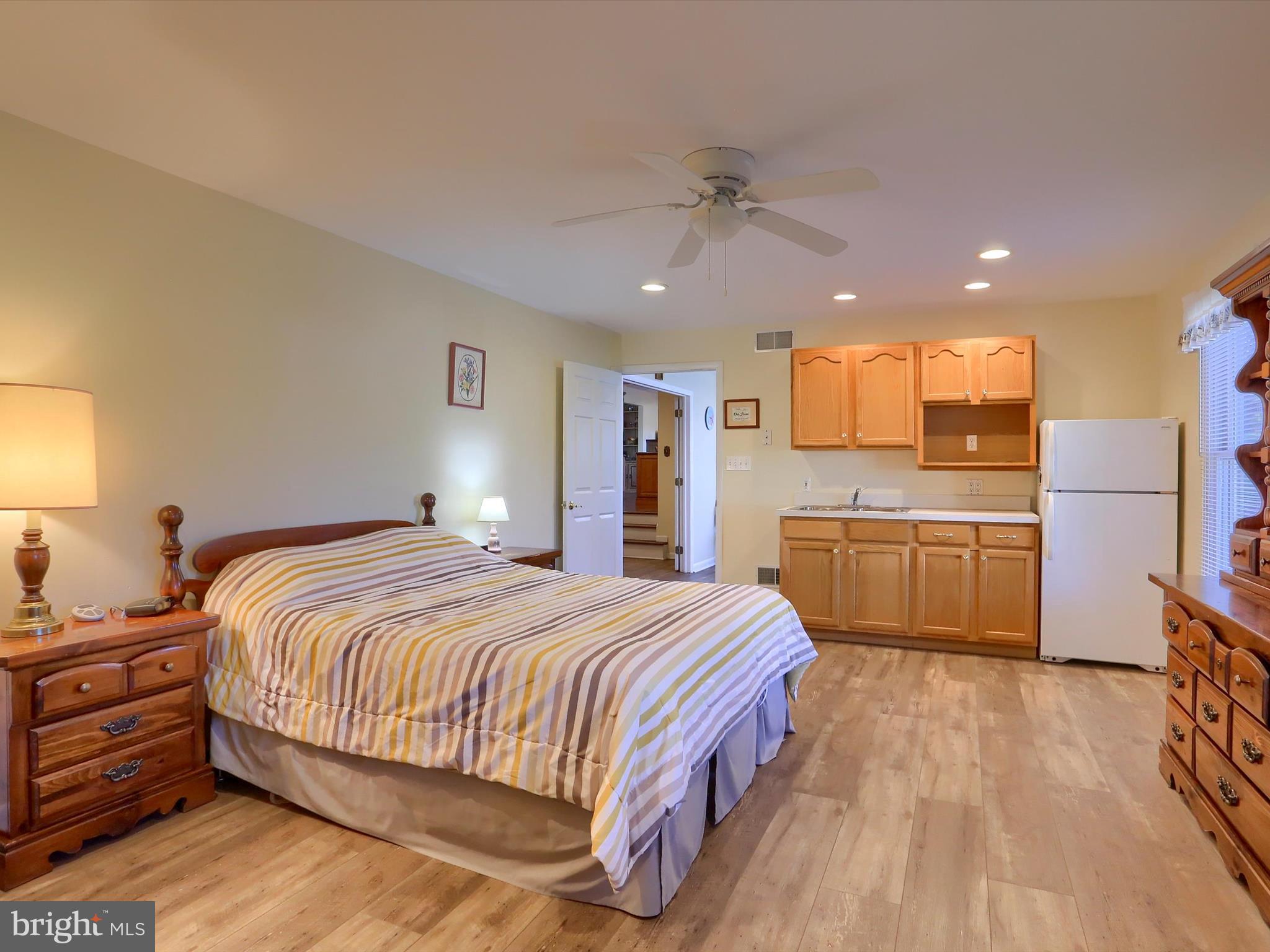 5256 Strathmore Drive Mechanicsburg, PA 17050 - Photo 18 of 47 a bedroom with a bed and a view of kitchen