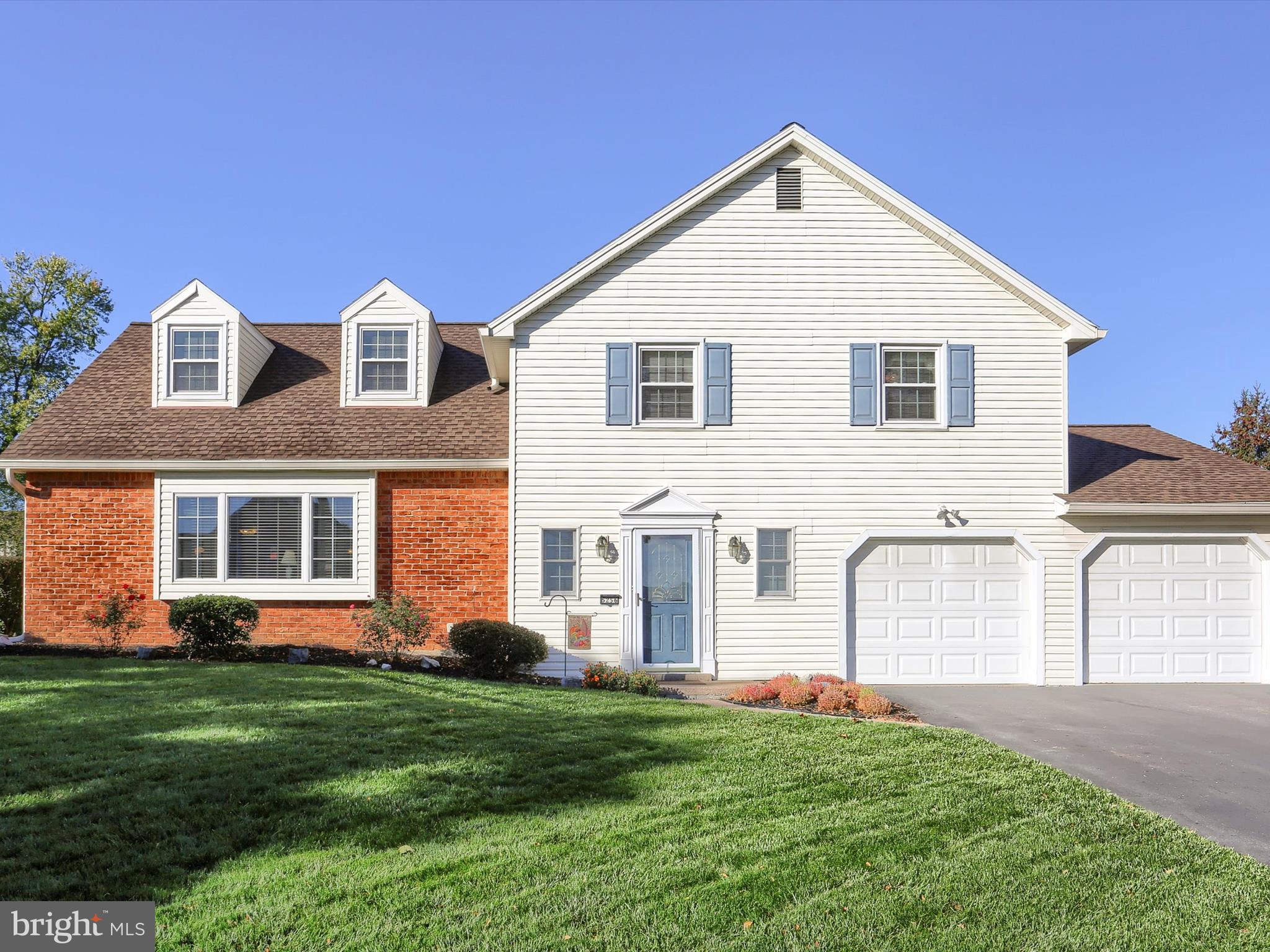5256 Strathmore Drive Mechanicsburg, PA 17050 - Photo 2 of 47 a front view of a house with a yard