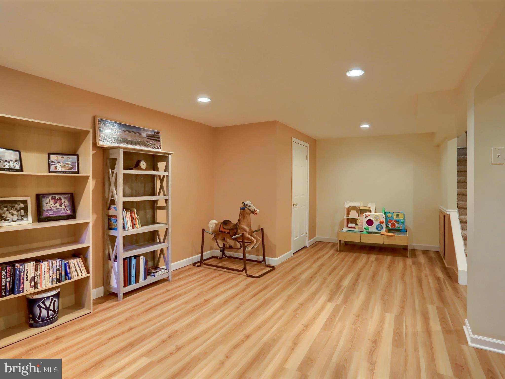 5256 Strathmore Drive Mechanicsburg, PA 17050 - Photo 31 of 47 a view of a livingroom with furniture and book shelf