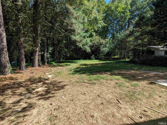 a view of a yard with a trees