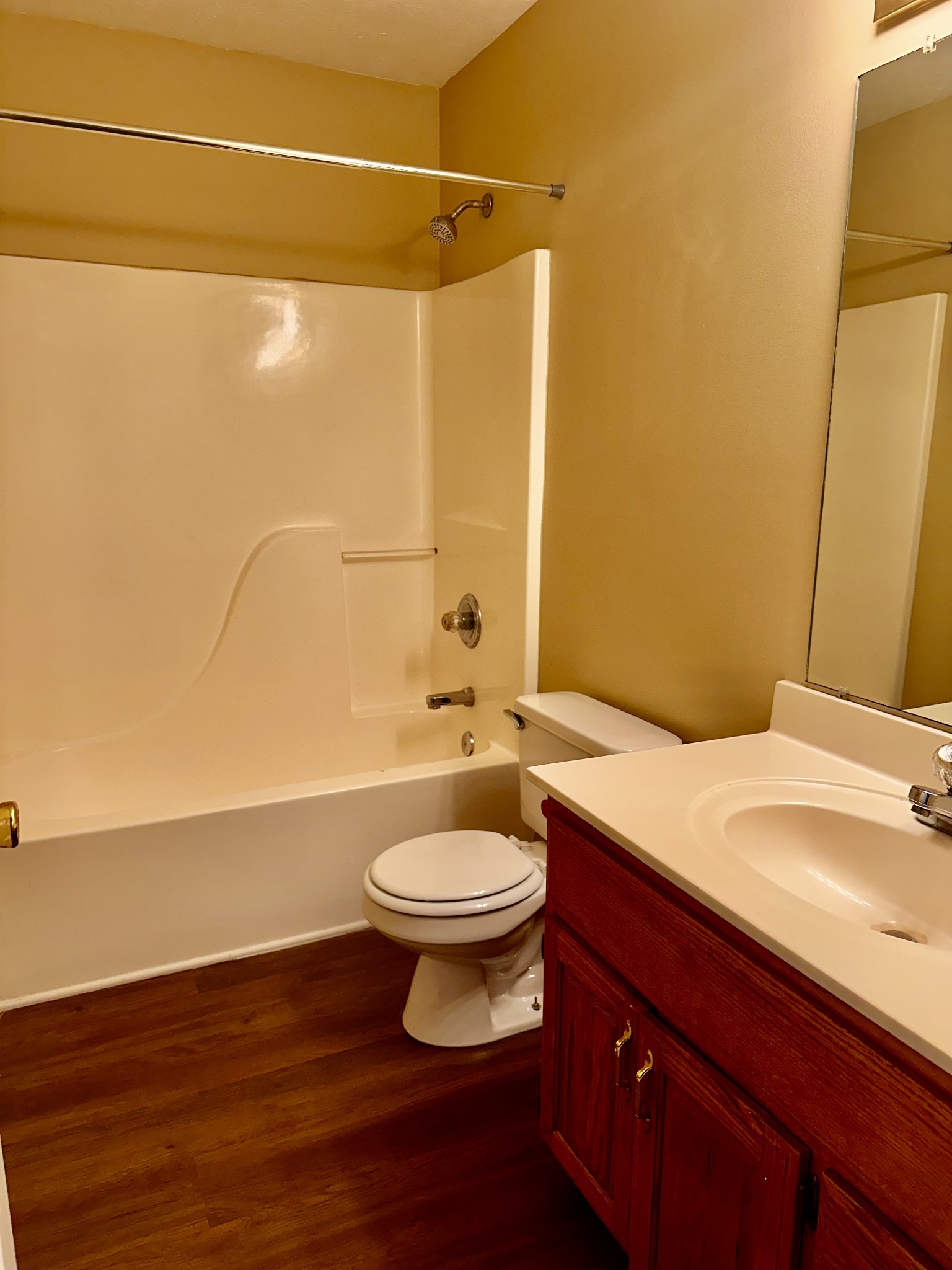 114 Emily Lane, Unit A Portland, TN 37148 - Photo 13 of 15 a bathroom with a sink a toilet and shower