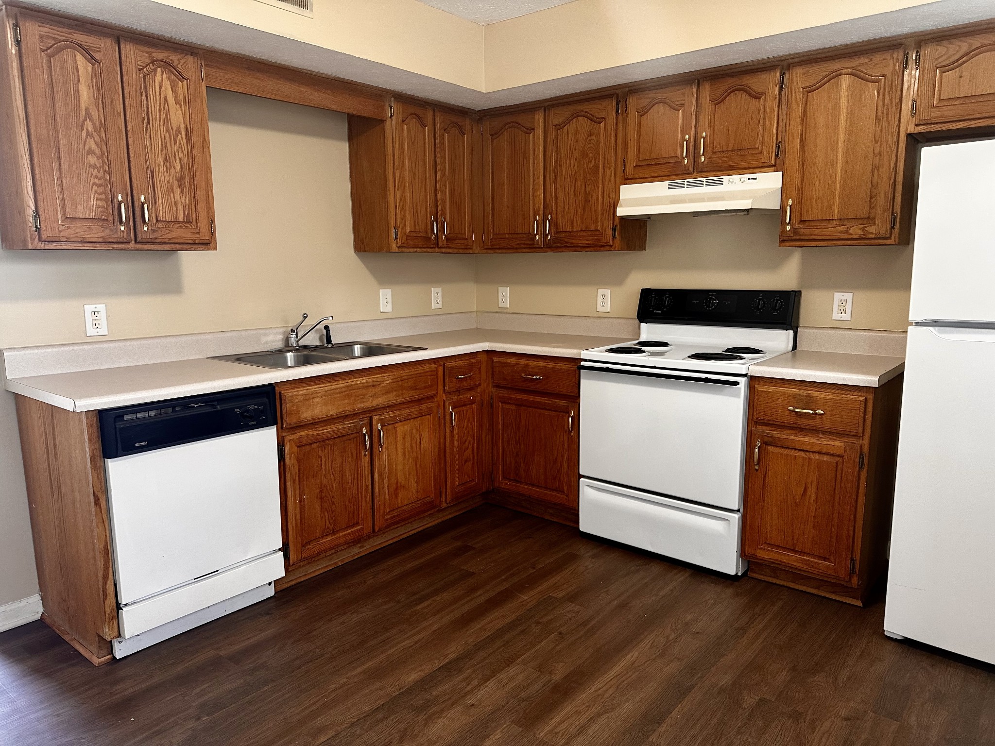 114 Emily Lane, Unit A Portland, TN 37148 - Photo 9 of 15 a kitchen with a sink a stove and cabinets