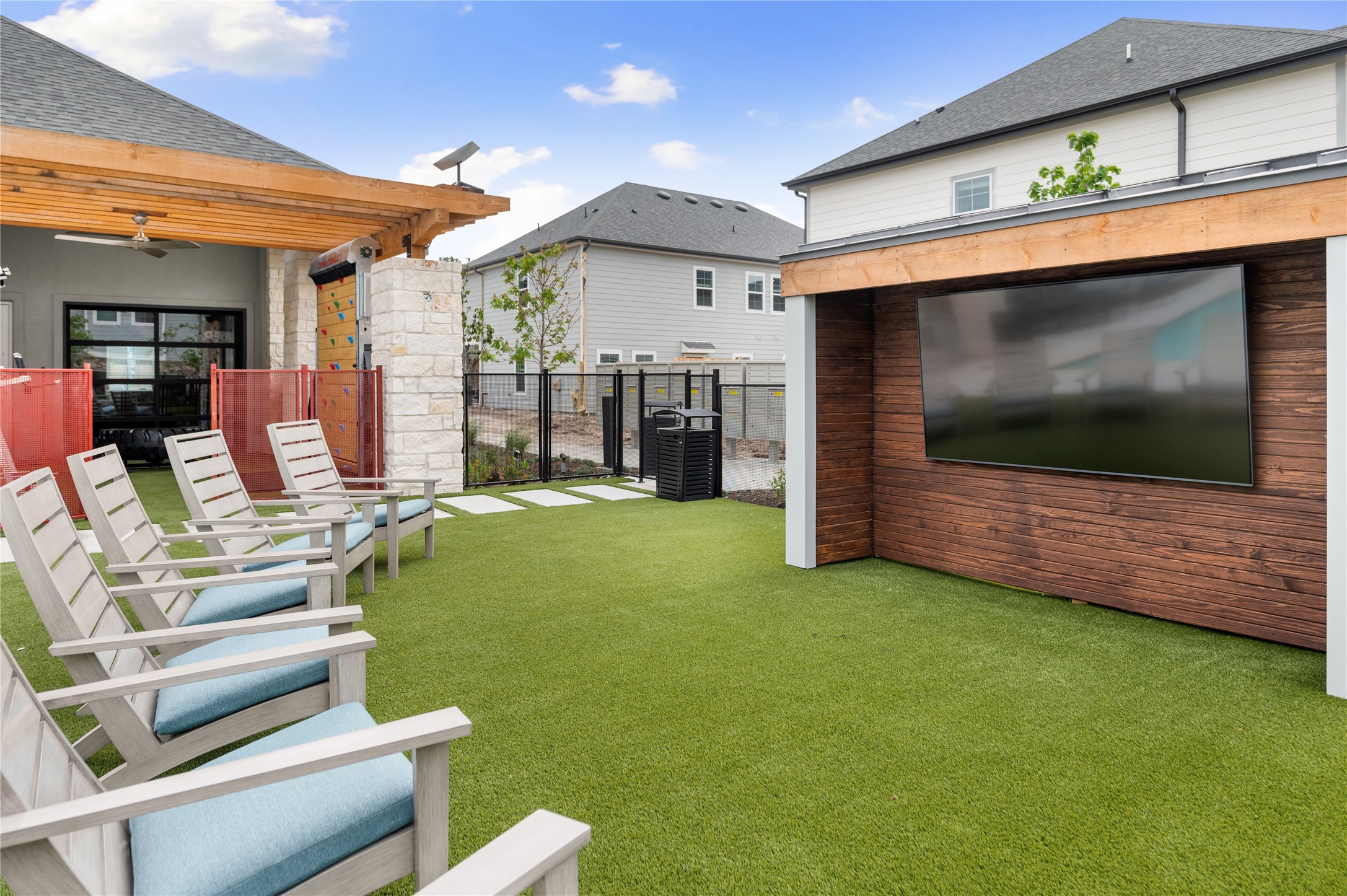 28328-225 Birnham Woods Drive Spring, TX 77386 - Photo 36 of 42 a living room with furniture and a flat screen tv