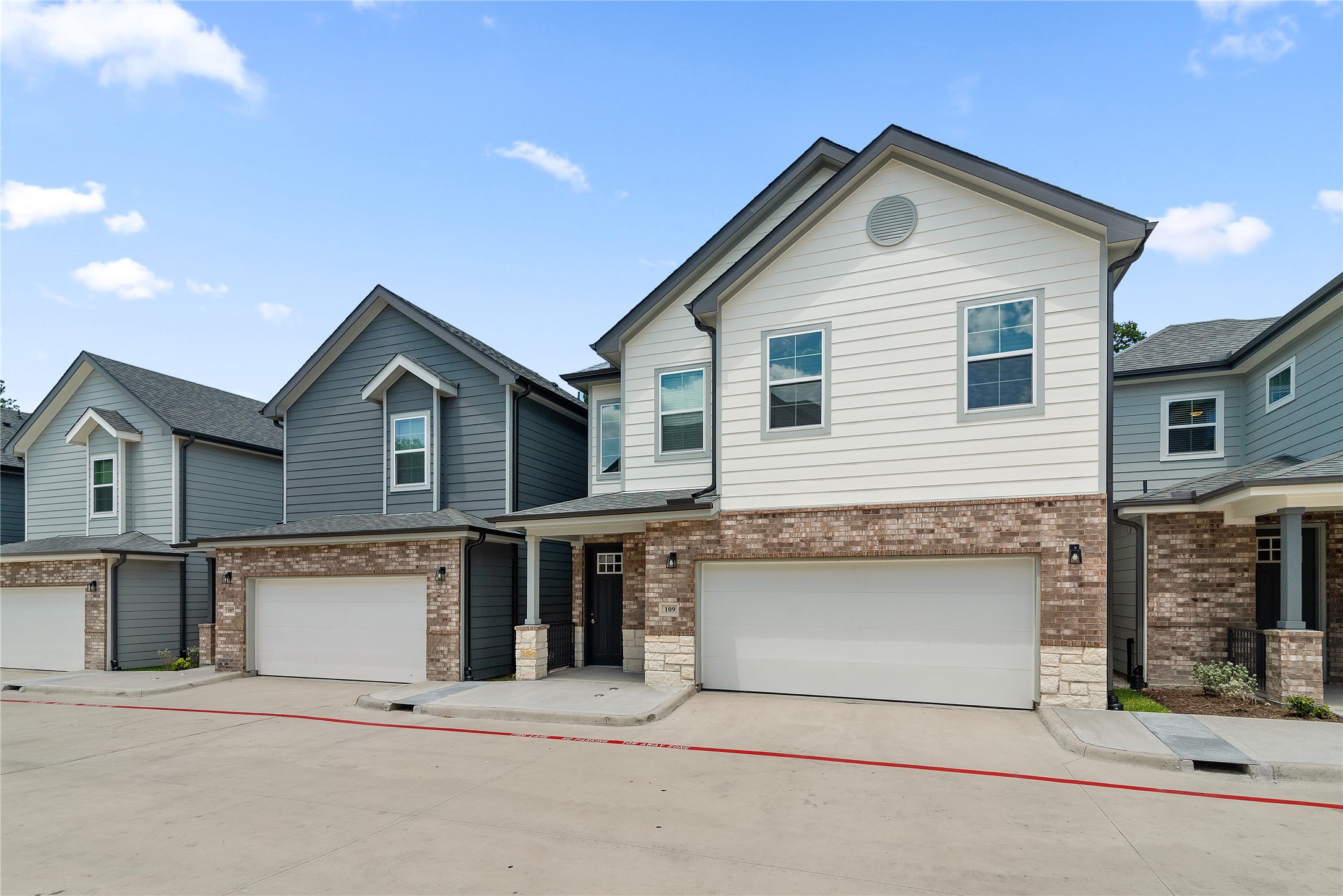 28328-225 Birnham Woods Drive Spring, TX 77386 - Photo 4 of 42 a view of a house with a garage and balcony
