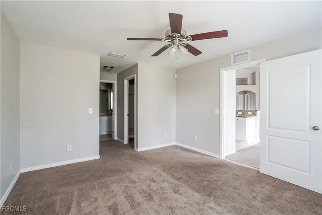 a view of a livingroom with a ceiling fan