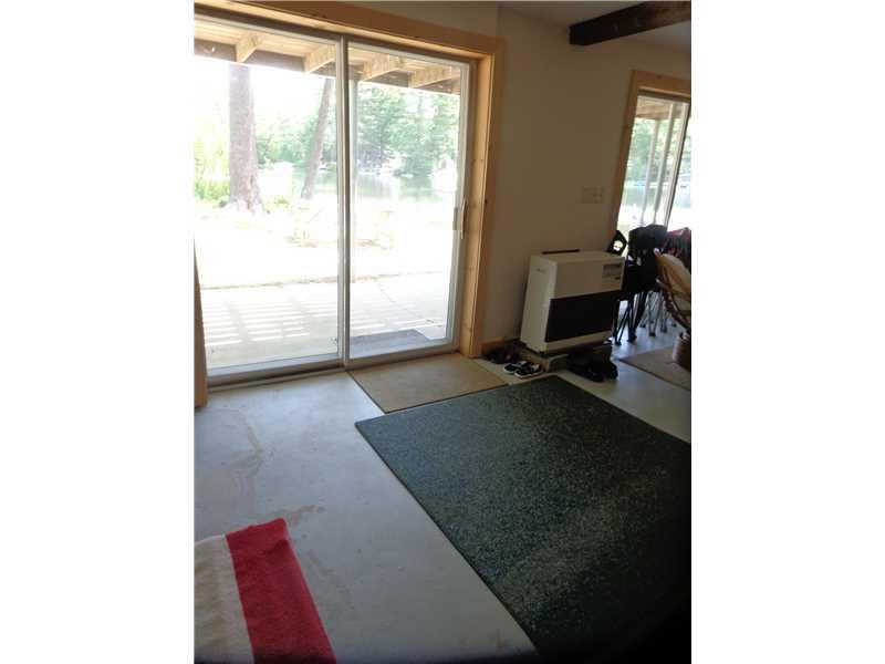 74 Deer Acres Road Raymond, ME 04071 - Photo 28 of 35 Family Room. Two sliders out the a...