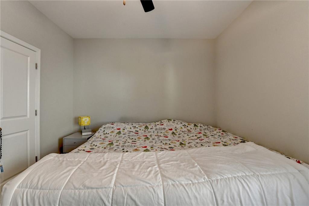 955 Laura Jean Court Buford, GA 30518 - Photo 50 of 68 a bedroom with a bed and a window