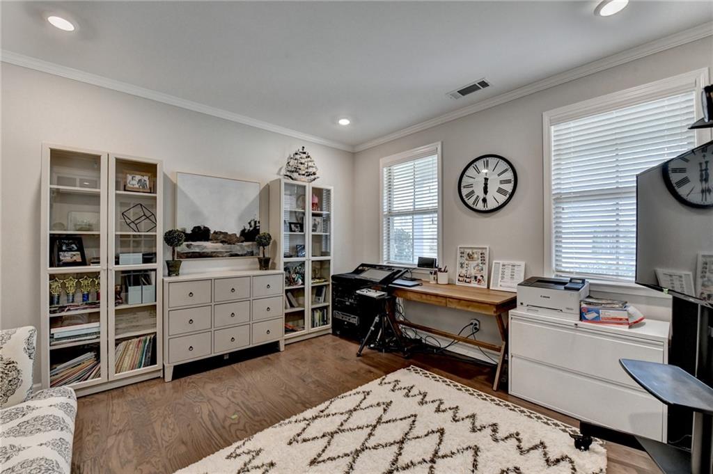 955 Laura Jean Court Buford, GA 30518 - Photo 62 of 68 a view of a workspace with furniture and a window