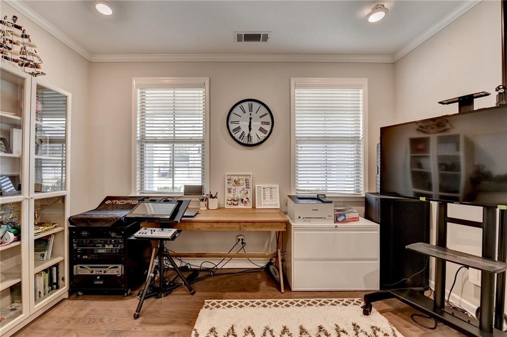 955 Laura Jean Court Buford, GA 30518 - Photo 63 of 68 a view of a workspace with furniture and a window