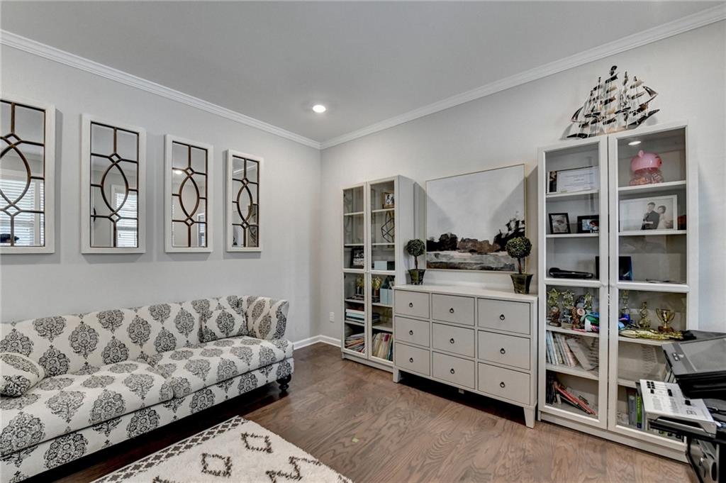955 Laura Jean Court Buford, GA 30518 - Photo 64 of 68 a living room with furniture cabinets and window