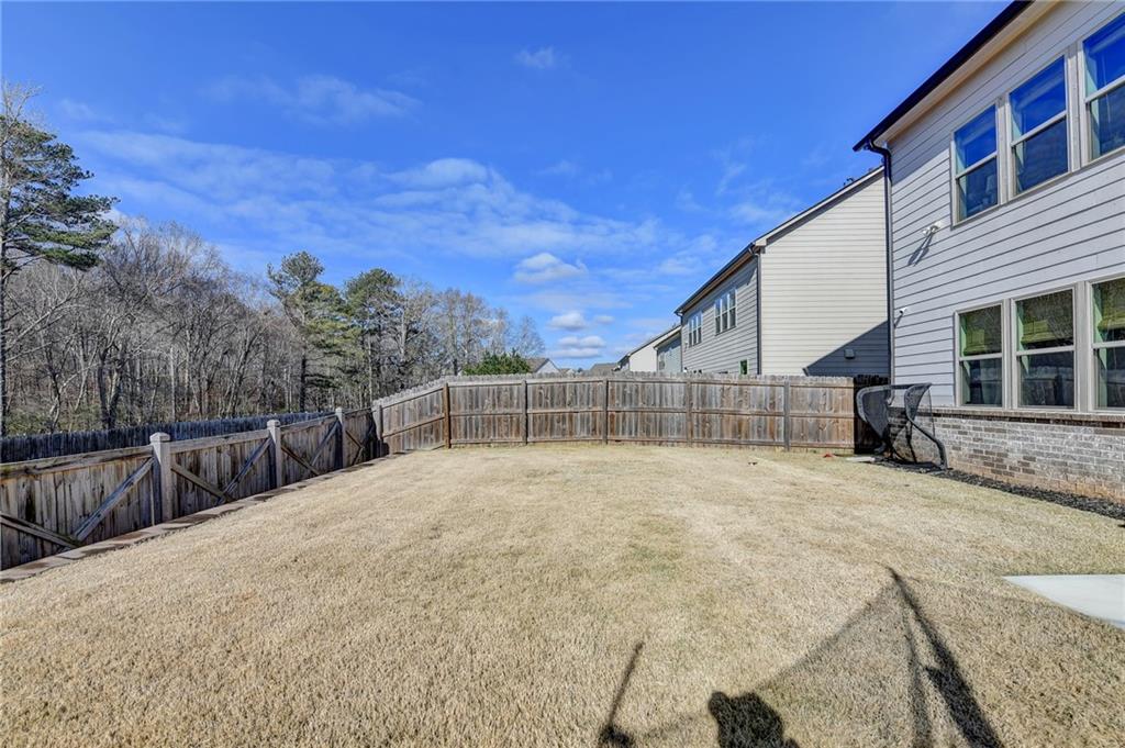 955 Laura Jean Court Buford, GA 30518 - Photo 68 of 68 a view of backyard of house