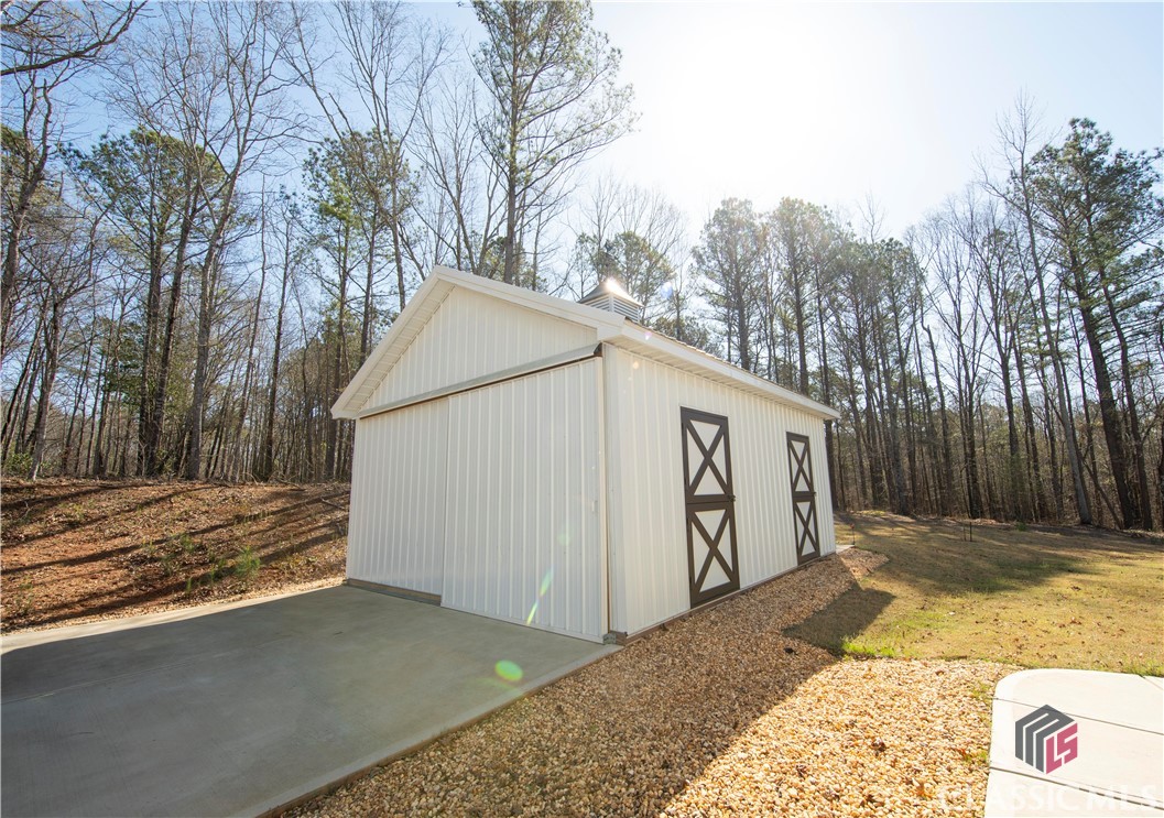 244 Black Thorn Road Colbert, GA 30628 - Photo 14 of 48 Storage Building/Extra Garage Space