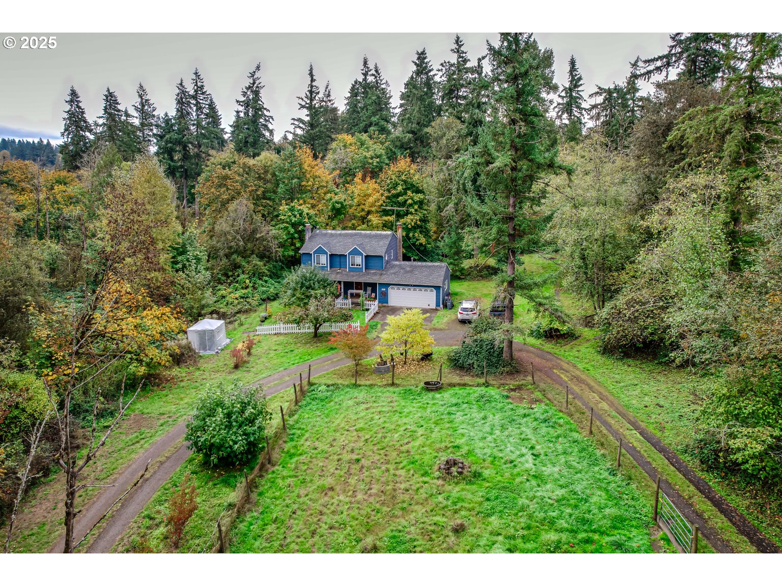 1809 Northwest 310th Street Ridgefield, WA 98642 - Photo 1 of 37 a view of a house with a yard and sitting area