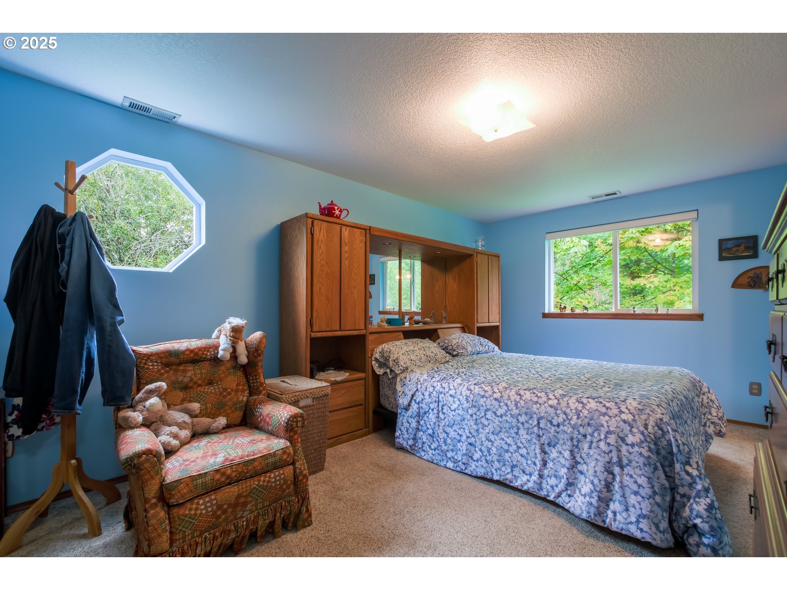 1809 Northwest 310th Street Ridgefield, WA 98642 - Photo 22 of 37 a bedroom with furniture and a window