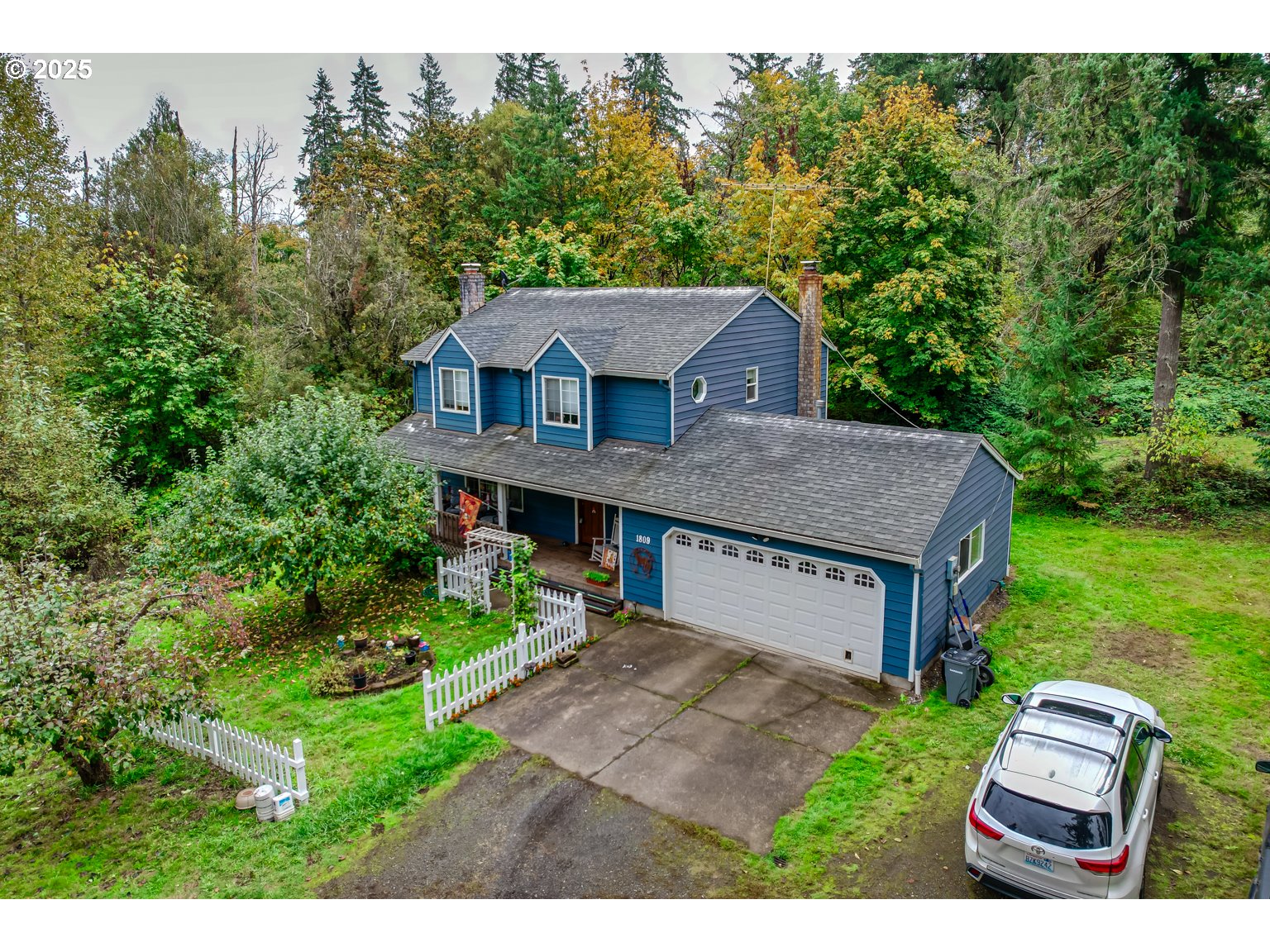 1809 Northwest 310th Street Ridgefield, WA 98642 - Photo 5 of 37 a house view with a garden space