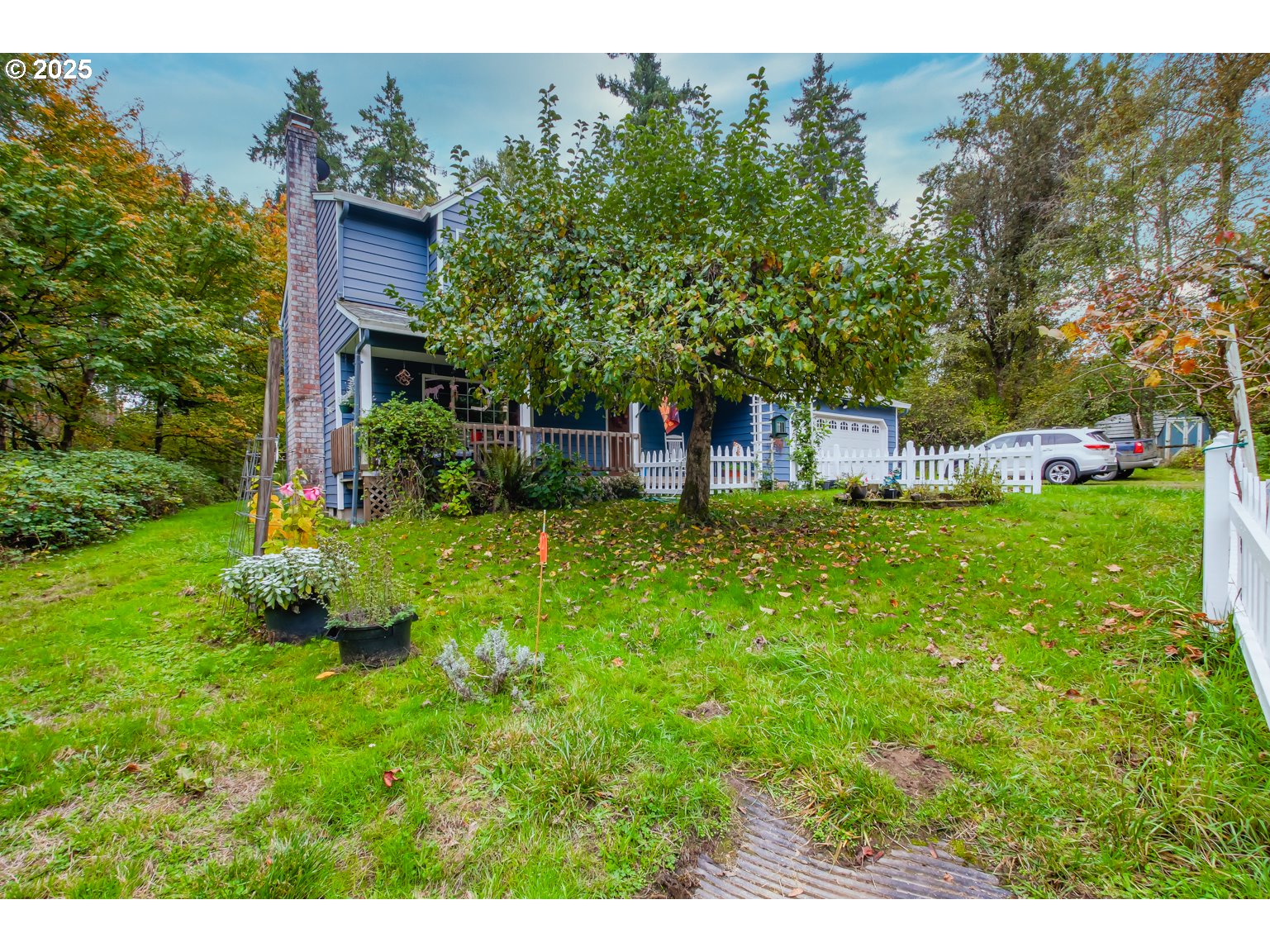 1809 Northwest 310th Street Ridgefield, WA 98642 - Photo 6 of 37 a view of a house with a yard porch and sitting area
