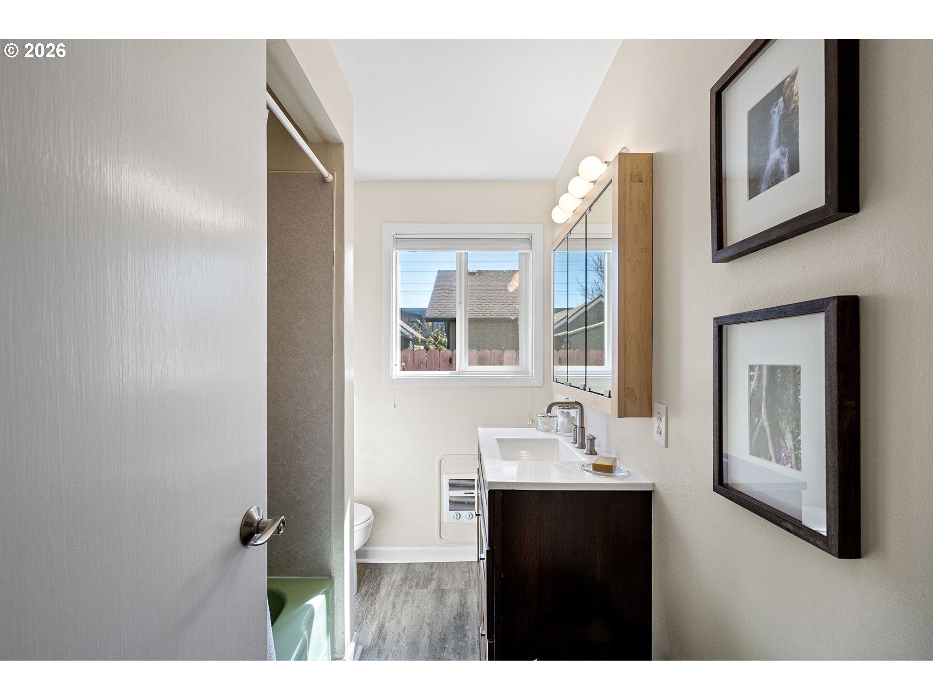 1255 Taylor Street Eugene, OR 97402 - Photo 10 of 48 a bathroom with a sink and a mirror