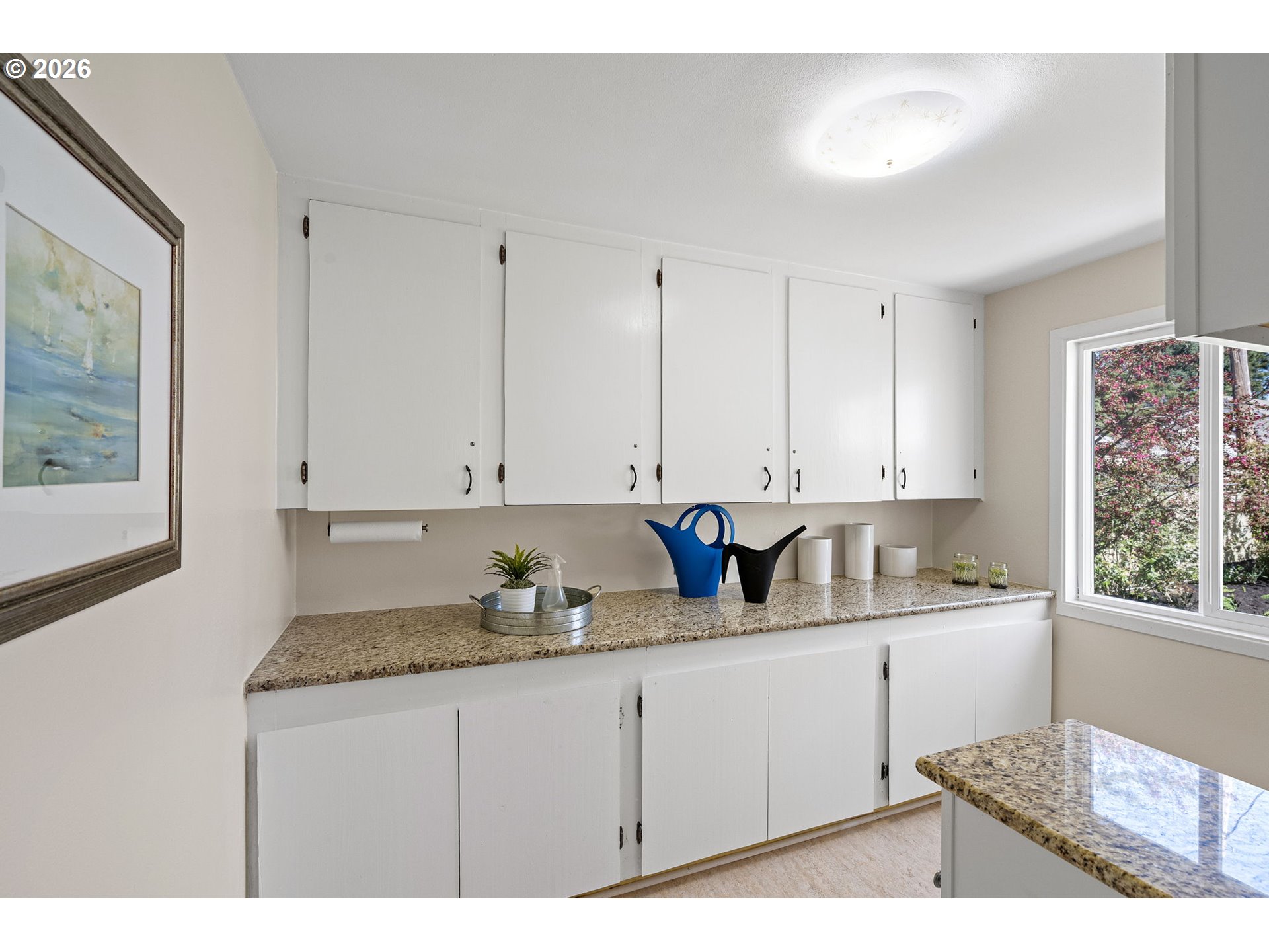 1255 Taylor Street Eugene, OR 97402 - Photo 21 of 48 a kitchen with stainless steel appliances granite countertop a sink stove and cabinets