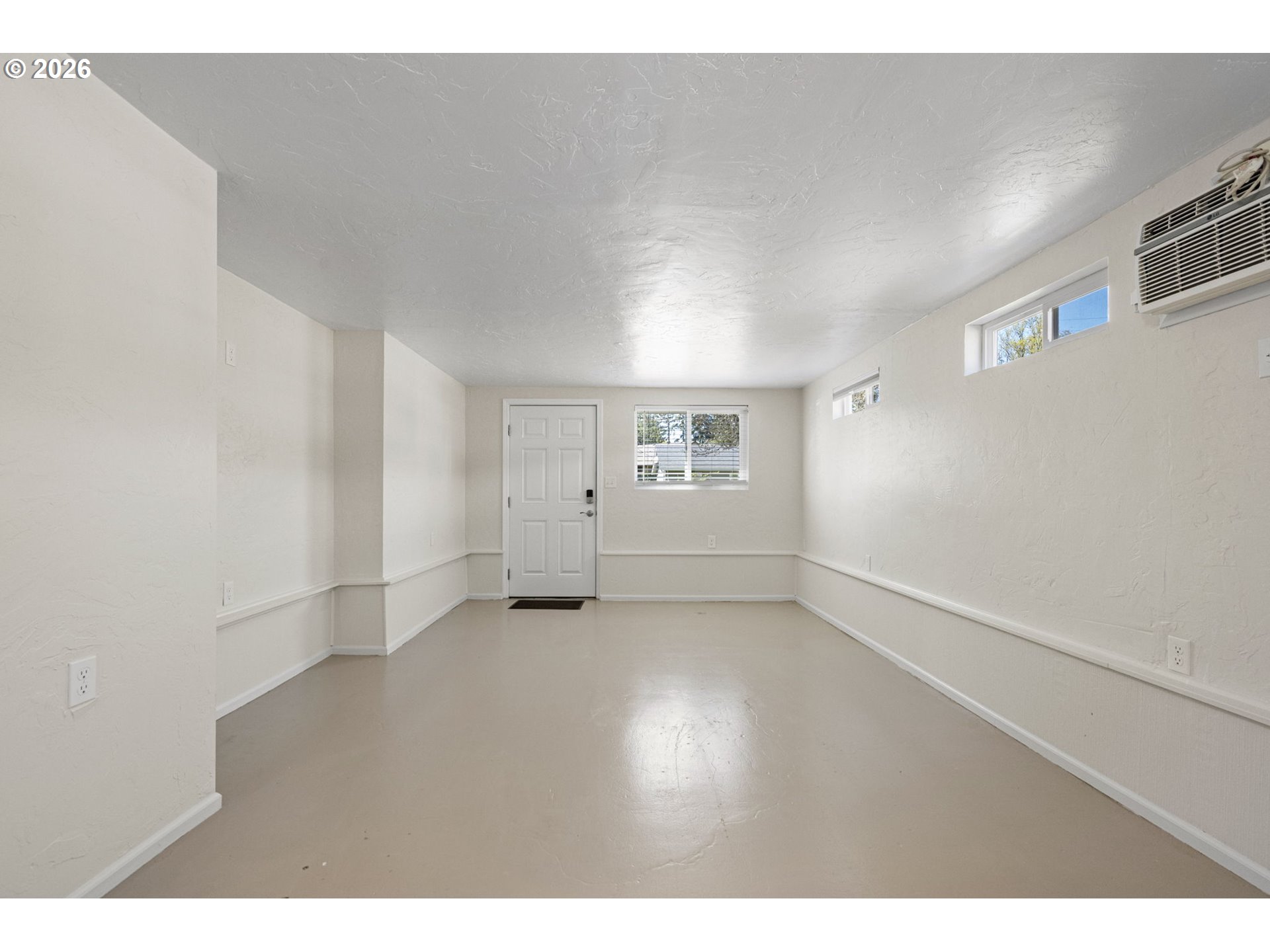 1255 Taylor Street Eugene, OR 97402 - Photo 24 of 48 a view of an empty room with a window