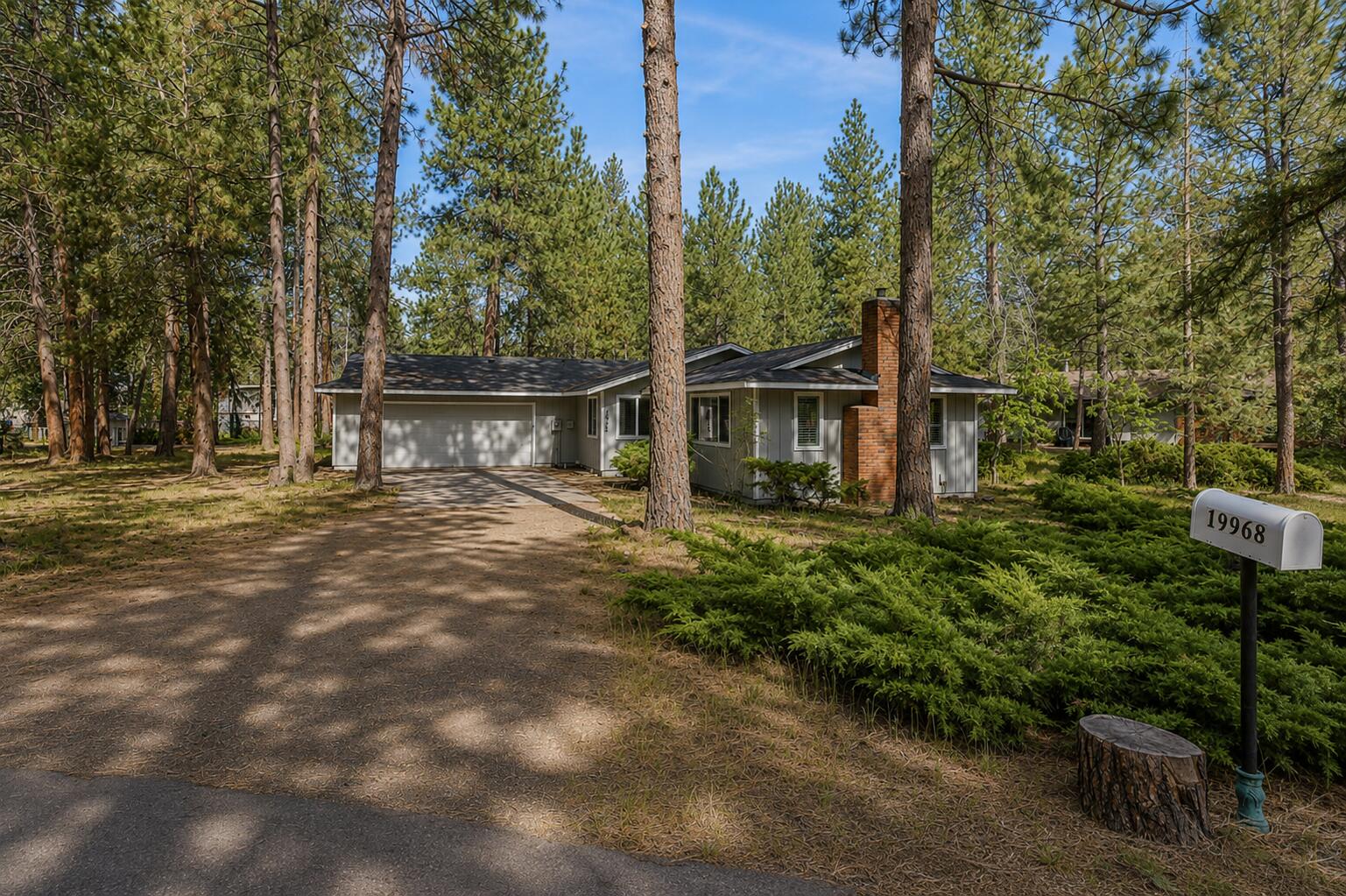 19968 Double Tree Court Bend, OR 97702 - Photo 25 of 28 a view of house with outdoor space